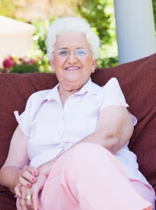 Senior woman sitting on garden chair